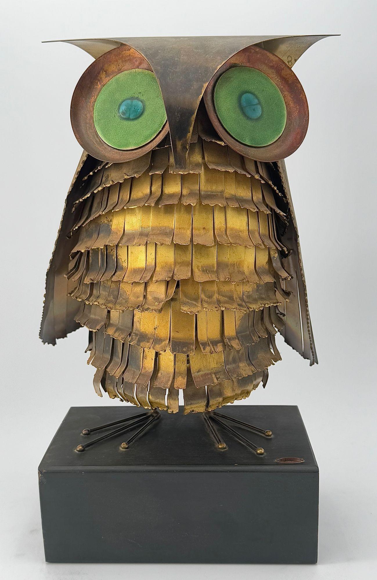 A wonderful 1966 torch cut brass Curtis Jere owl, with green enamelled eyes. 3