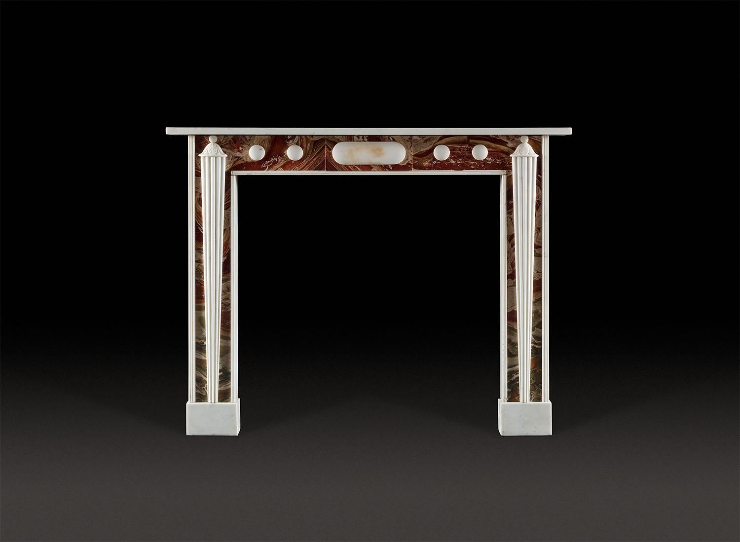 A wonderful, early 20th century, Statuary and Jasper fireplace after a design by Henry Holland

An early 20th century, statuary and Jasper marble fireplace after an original design by Henry Holland (now in the RIBA collection), circa 1796, for one