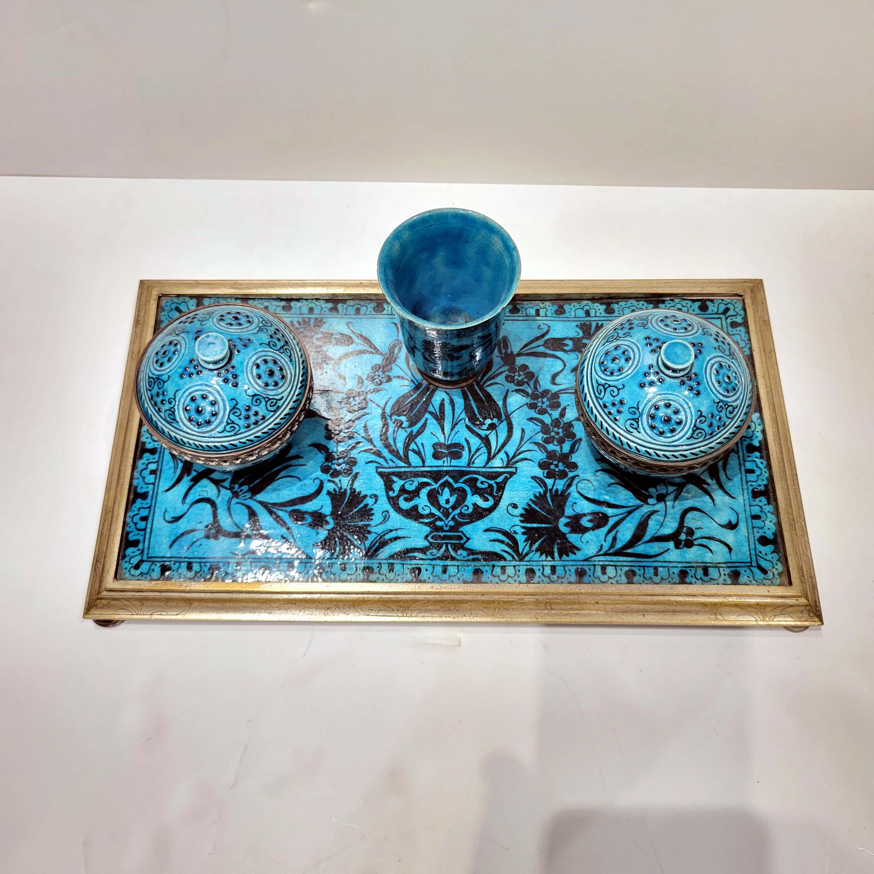A beautiful rare silvered bronze mounted double inkwell in Islamic taste after Seljuk tile design.
Circa late 19th century.
Hand painted and glazed ceramic mounted in silvered bronze.
  