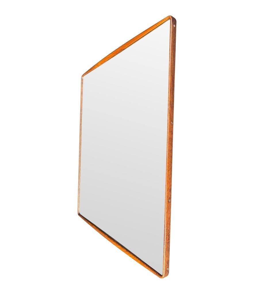 Mid-20th Century A wonderful, large Italian 1950s mirror by Ico Parisi with curved walnut frame For Sale