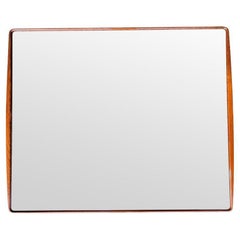 A wonderful, large Italian 1950s mirror by Ico Parisi with curved walnut frame