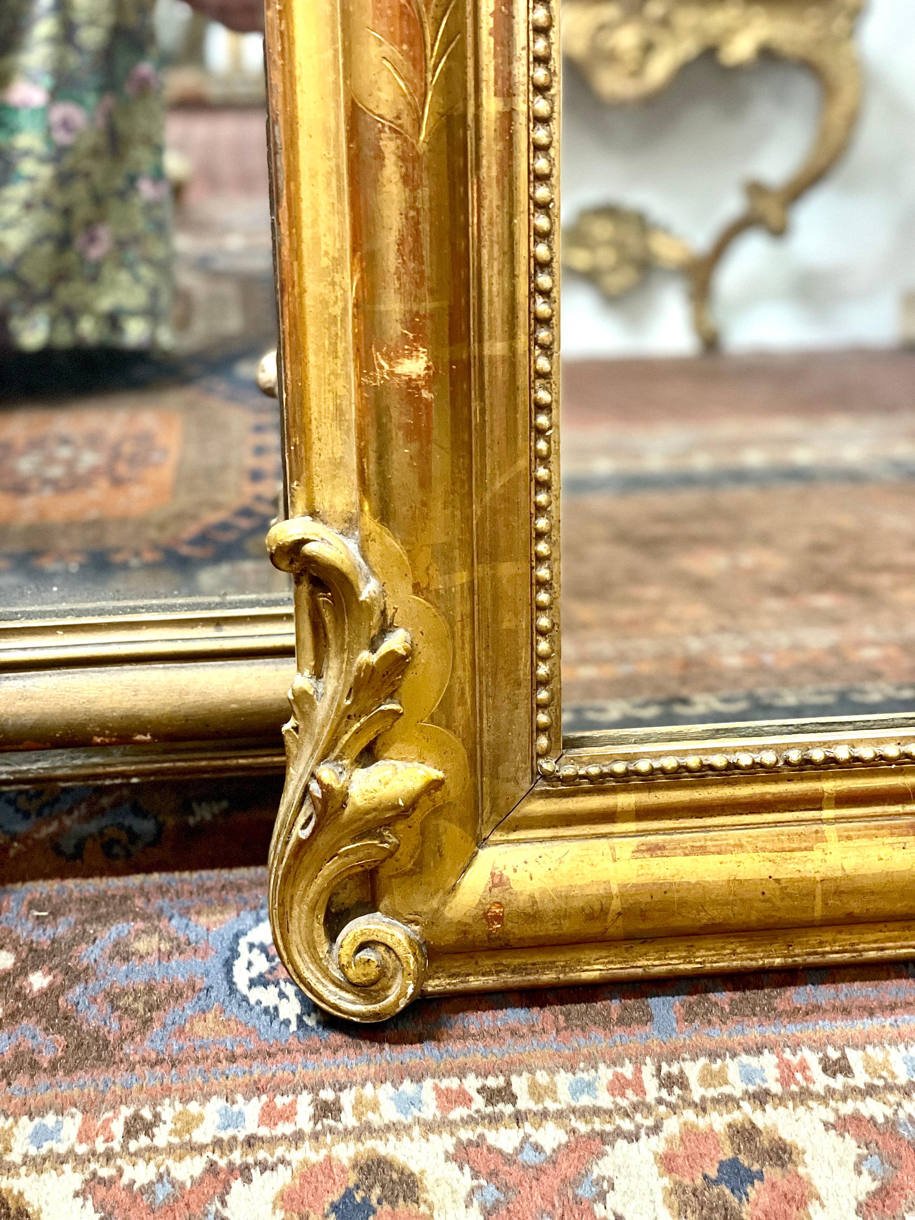 French A wonderful Louis Philippe Gilt Mirror, with Crest of Cherubs
