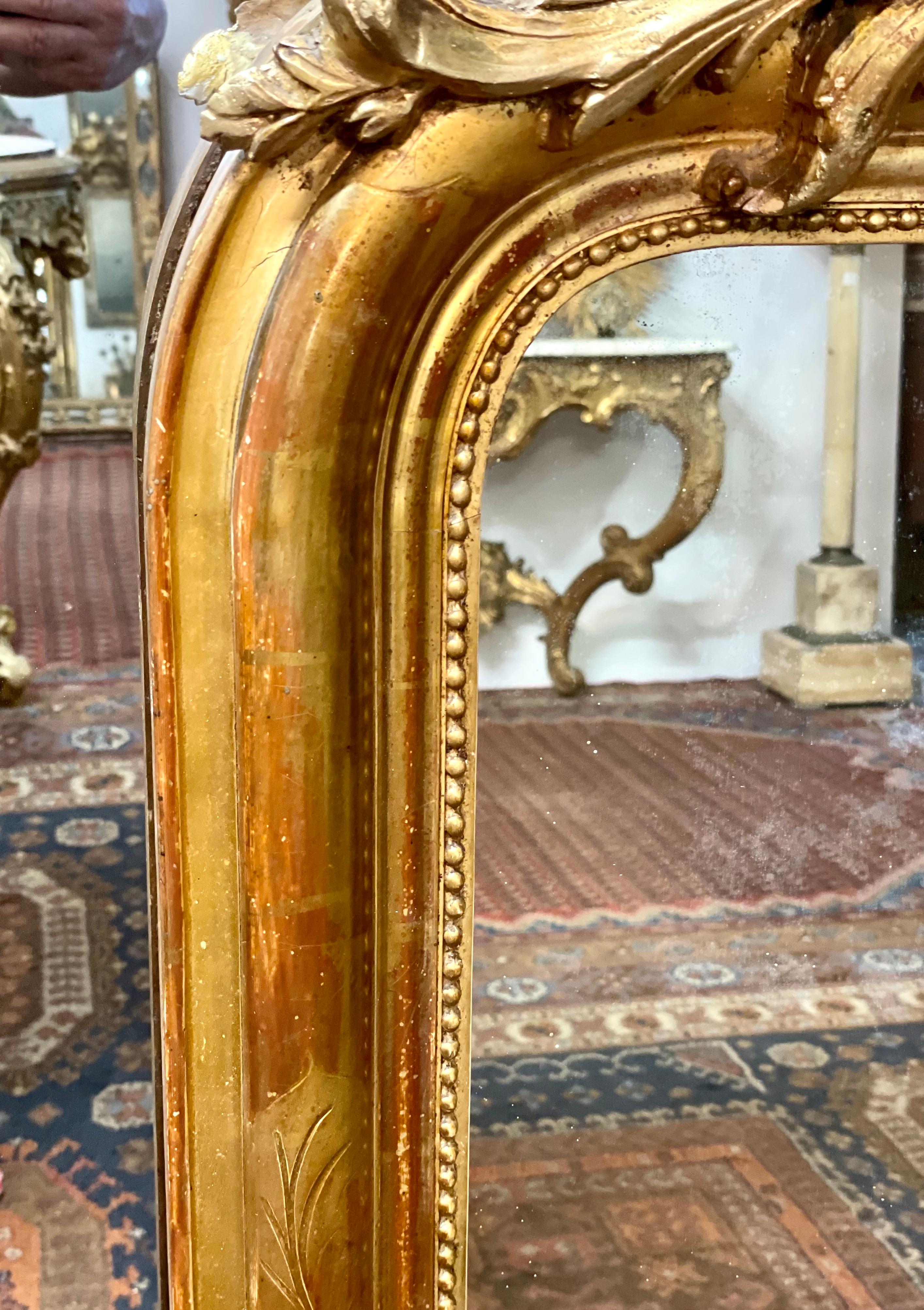 19th Century A wonderful Louis Philippe Gilt Mirror, with Crest of Cherubs