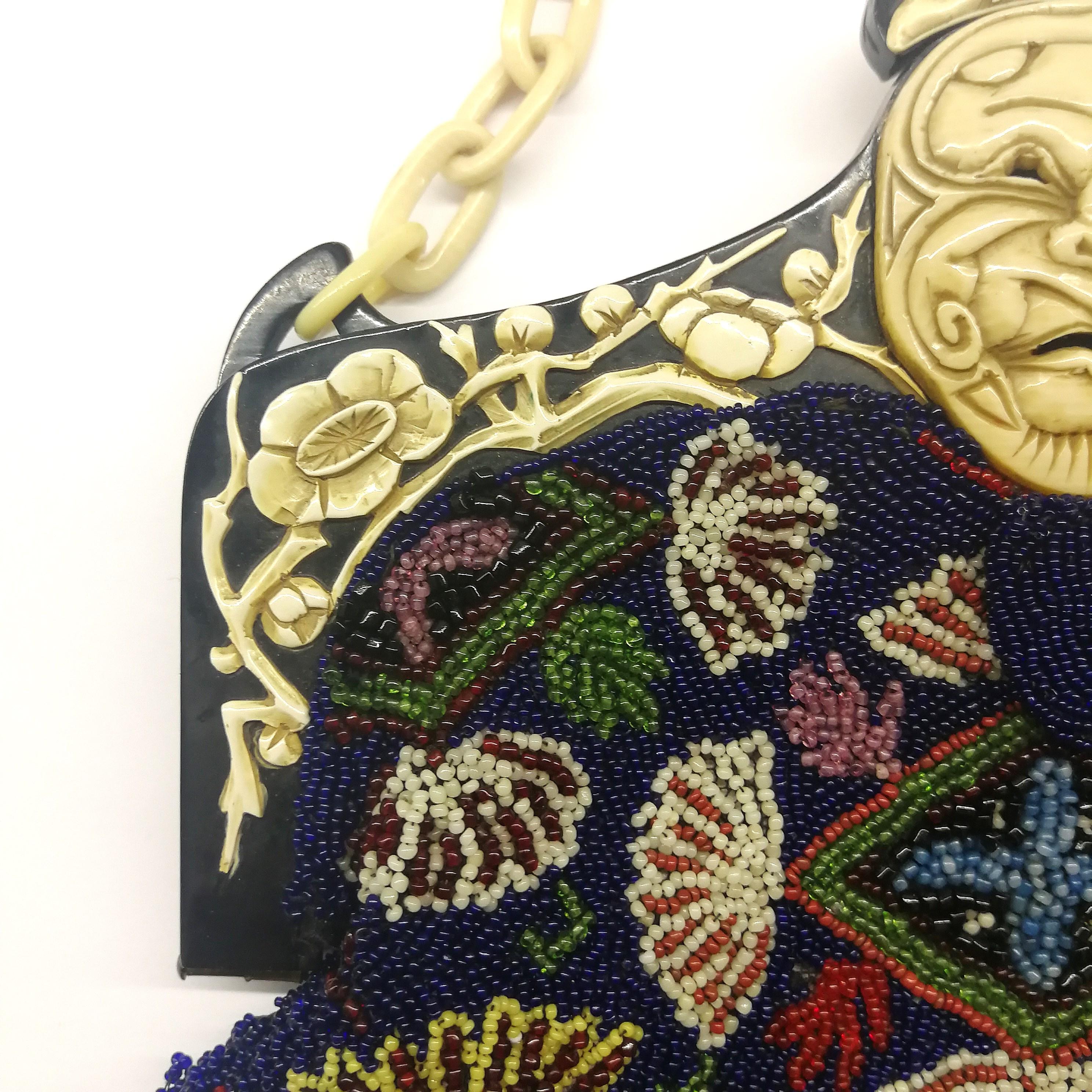 A wonderful micro beaded handbag, with an Oriental mask frame, France, 1920s In Excellent Condition In Greyabbey, County Down