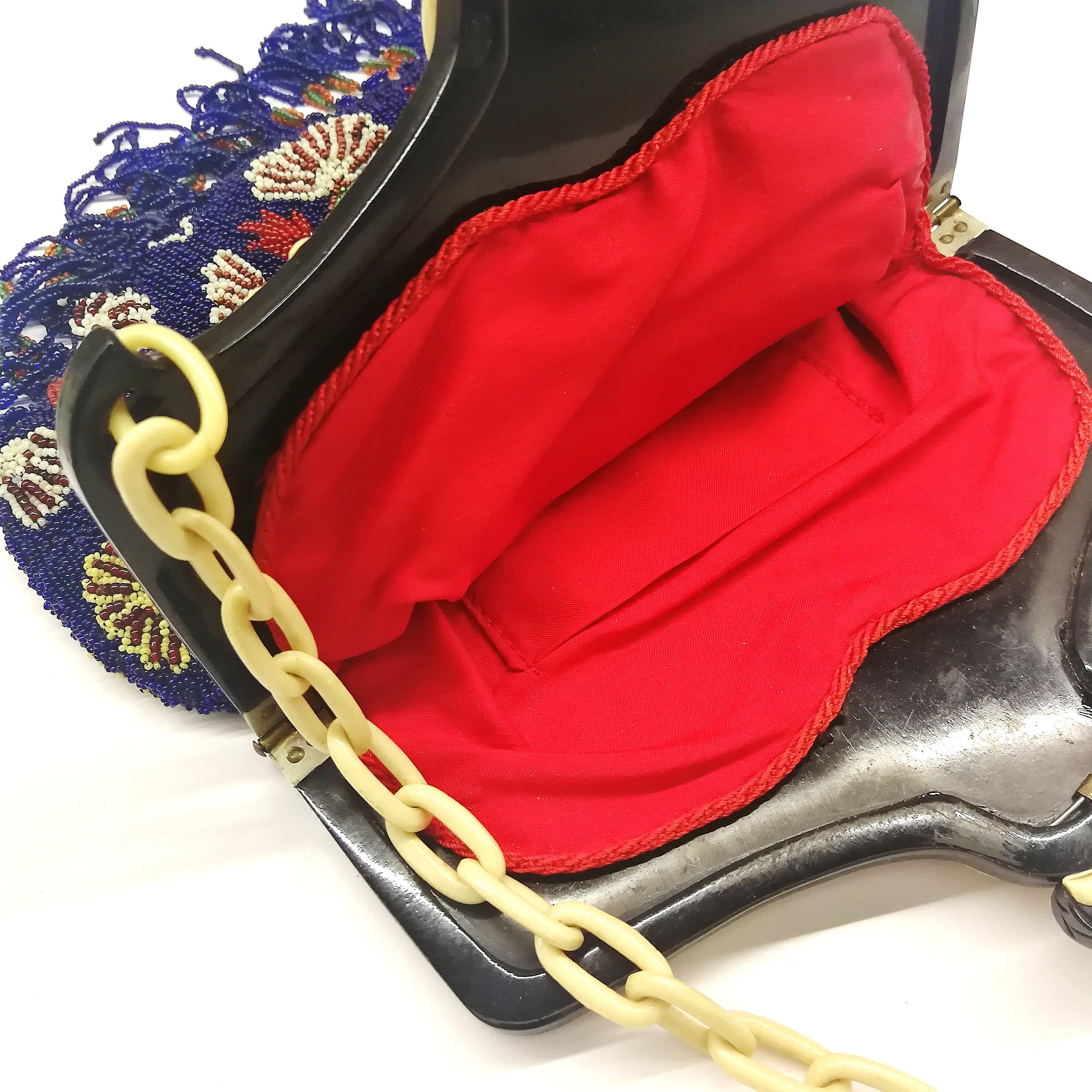 A wonderful micro beaded handbag, with an Oriental mask frame, France, 1920s 4