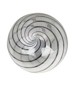 A wonderful Venini murano glass swirl ceiling light with brass top fittings