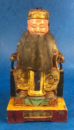 Wonderfully Decorative Piece of a Painted China Man Sitting on a Stool