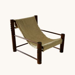 A wooden armchair with a wool seat, France, 1960s.