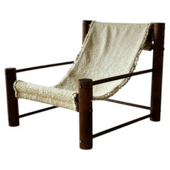 A wooden armchair with a wool seat, France, 1960s.