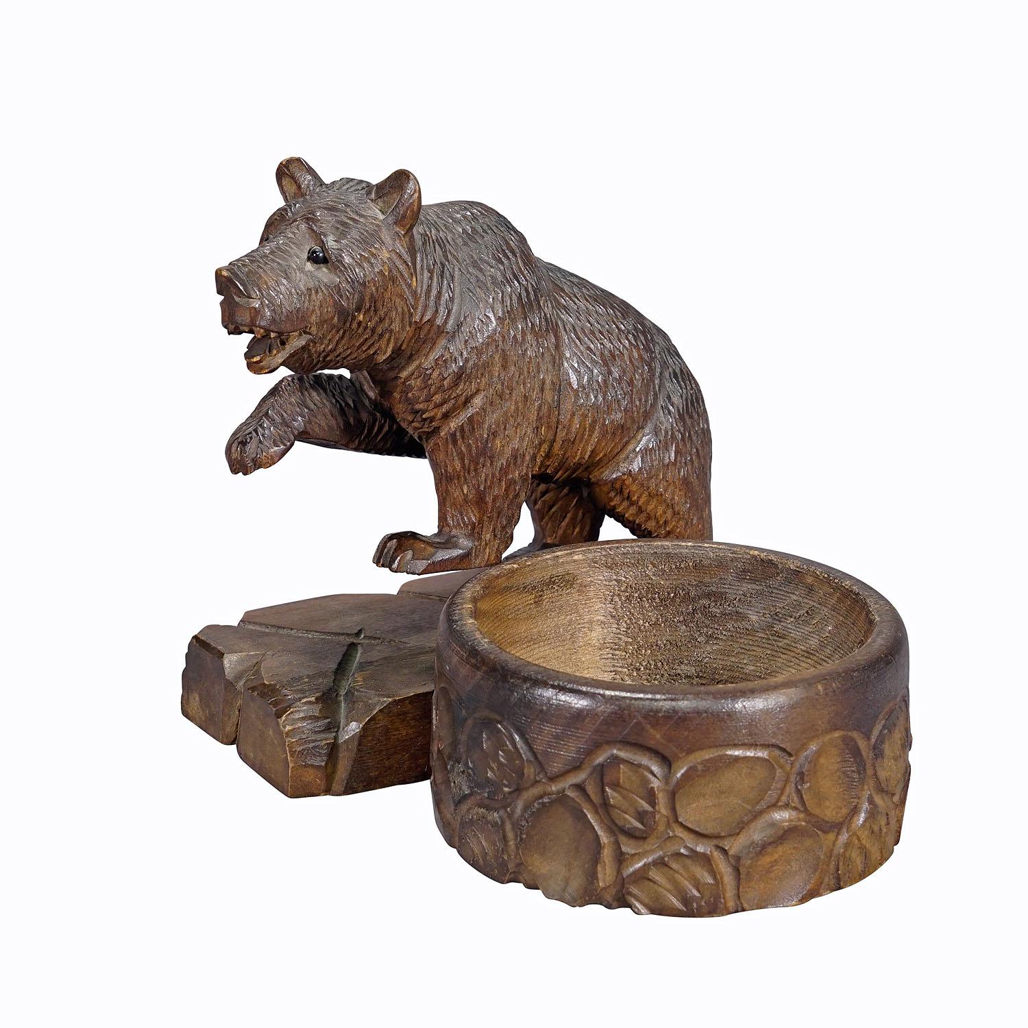 A Wooden Carved Black Forest Bear with Bowl ca. 1920s
Item e7283
A nicely carved Black Forest bear desk set with bowl for small utensils. Executed in Brienz, Switzerland around 1920. Very good condition.

The tradition of wood carving, using manual