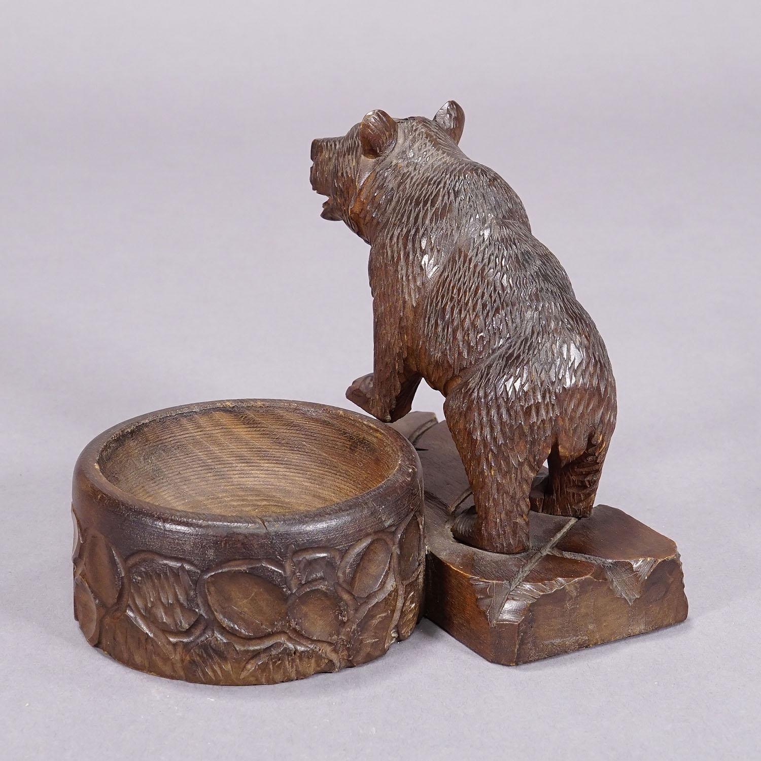 20th Century A Wooden Carved Black Forest Bear with Bowl ca. 1920s For Sale