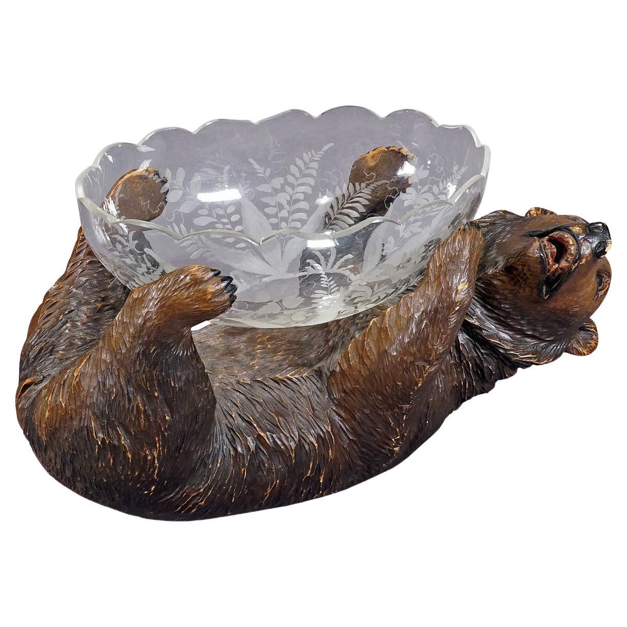 A Wooden Carved Black Forest Bear with Glass Bowl ca. 1900s