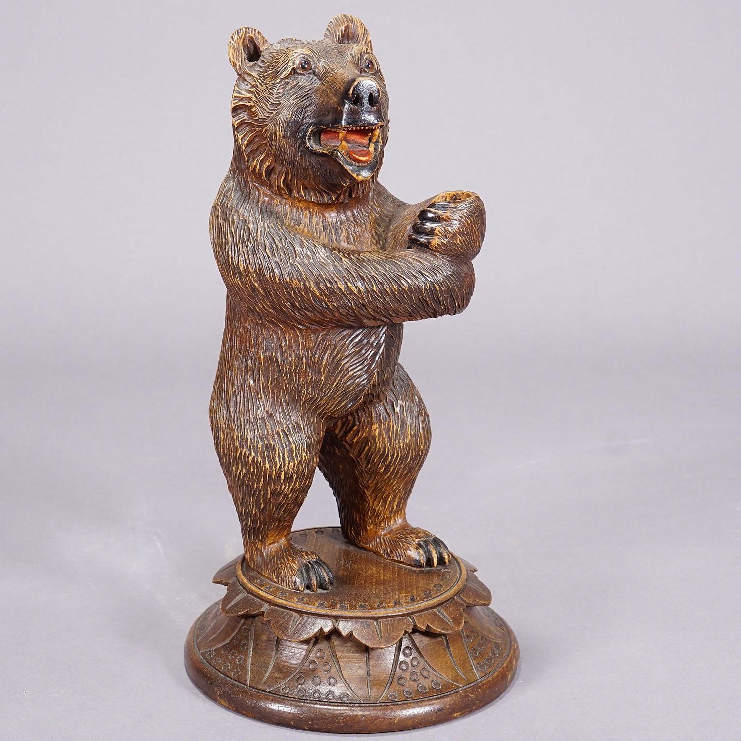A Wooden Carved Black Forest Bear with Glass Vase For Sale 1