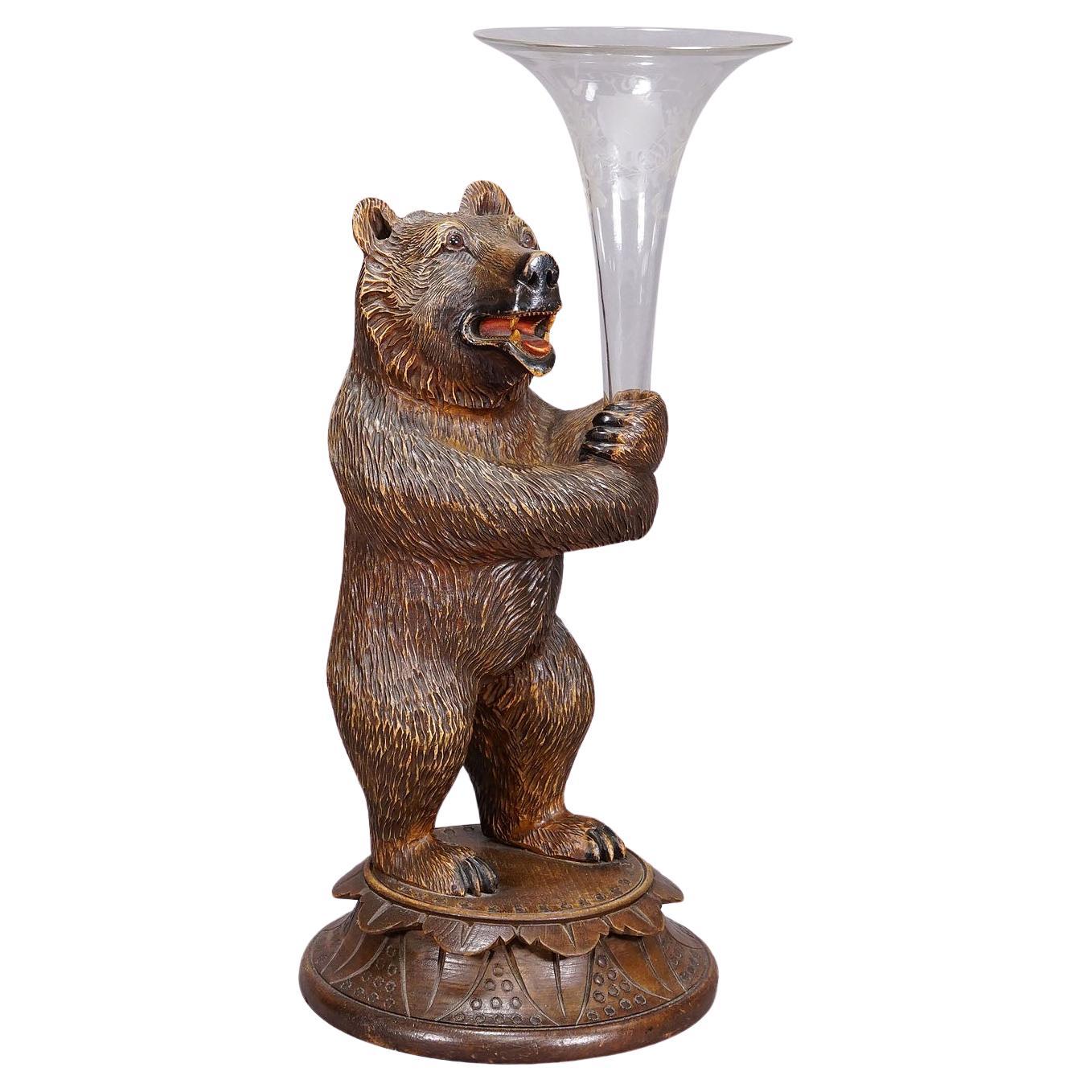 A Wooden Carved Black Forest Bear with Glass Vase For Sale