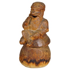 Nain fumeur en bois sculpté - Fumeur d'encens, vers 1930