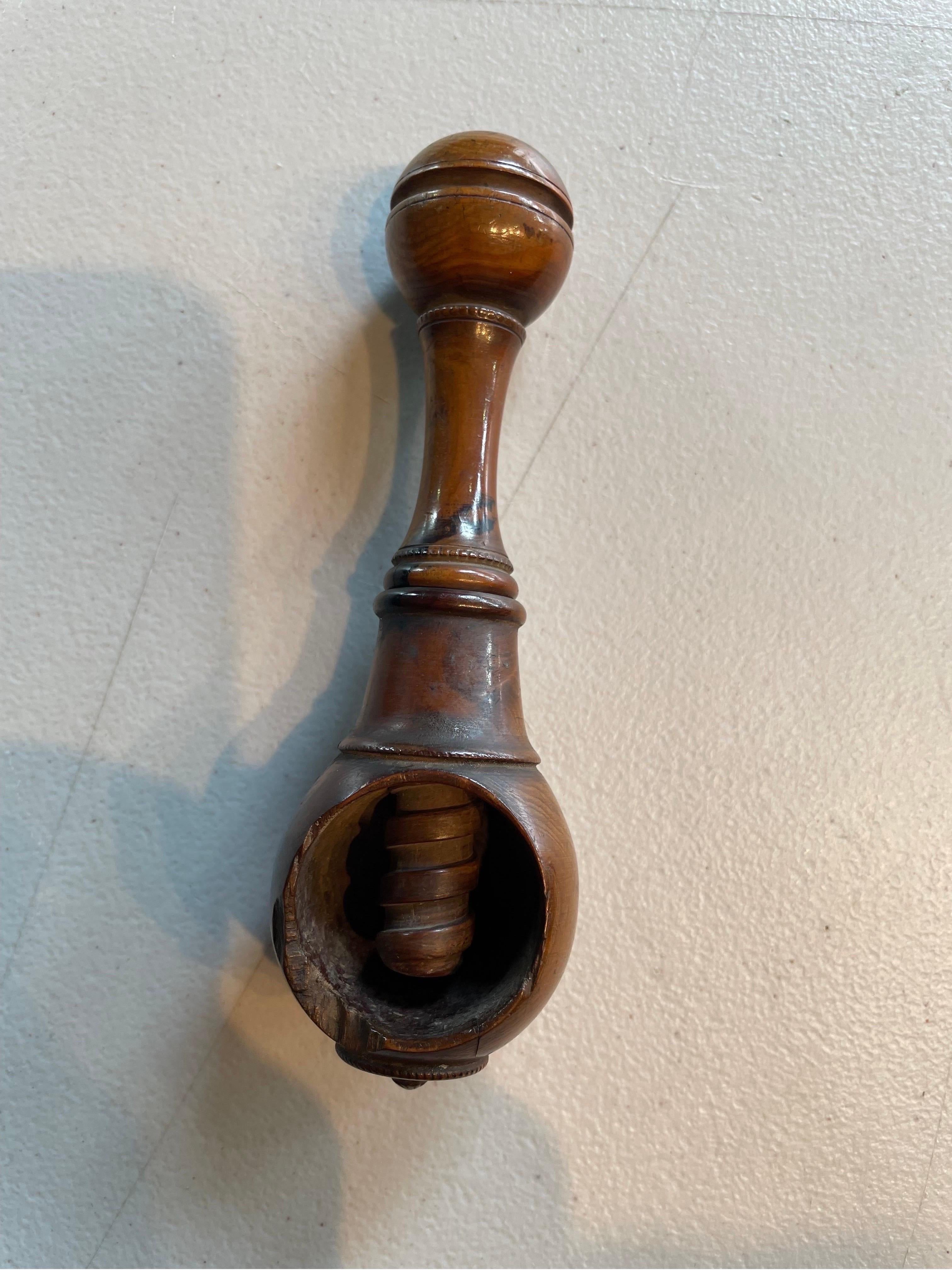 A Wooden Carved Treen Nutcracker, 19th Century

Dimension: Height: 15 cm Diameter: 5 cm.

Provenance: Private Australian Collection.