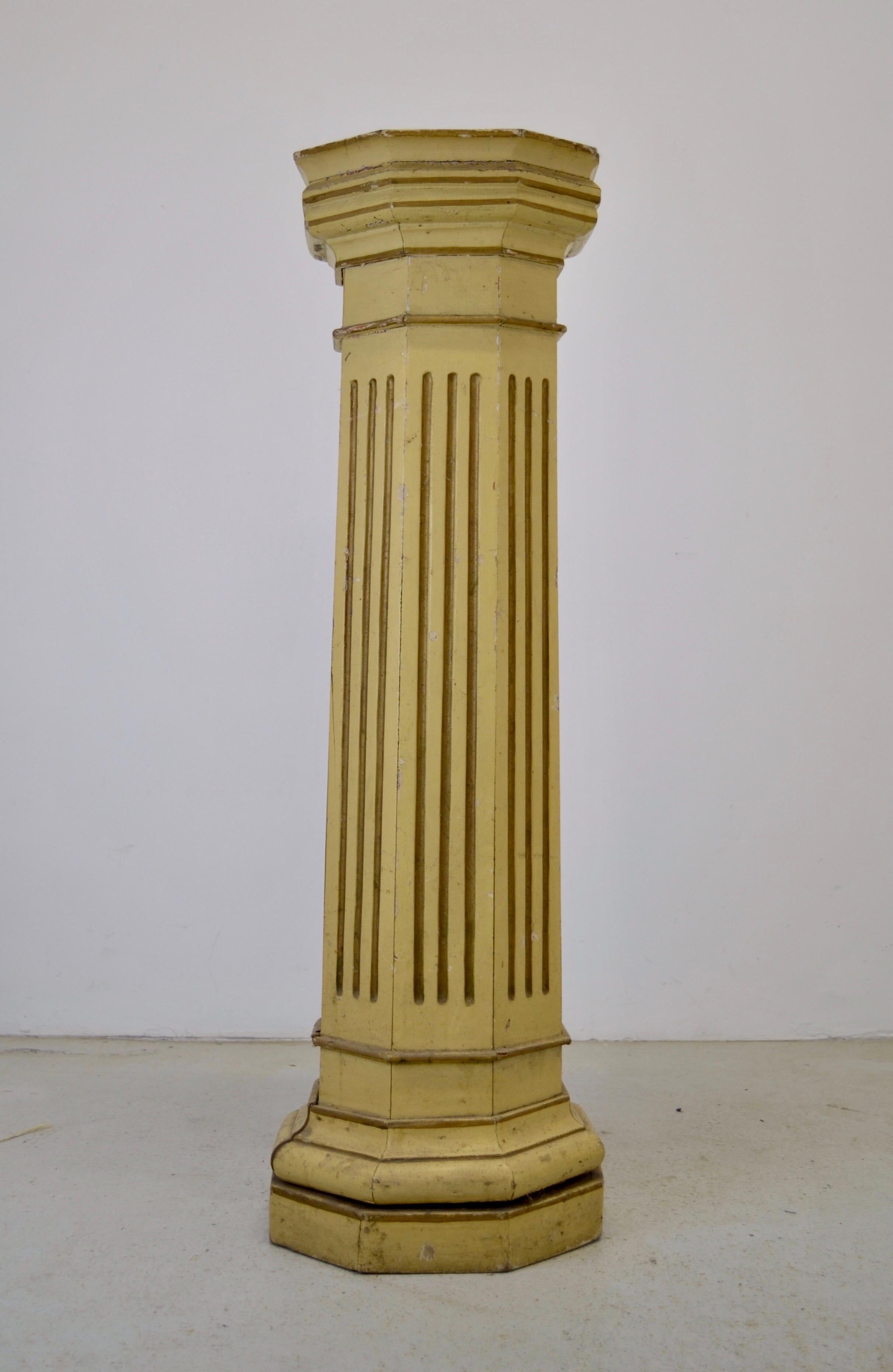  A french church pedestal from the 19th or early 20th century, made of solid pine, with an original cream-colored patina adorned with gilding. Despite some minor losses, it remains very stable and retains a superb patina.
