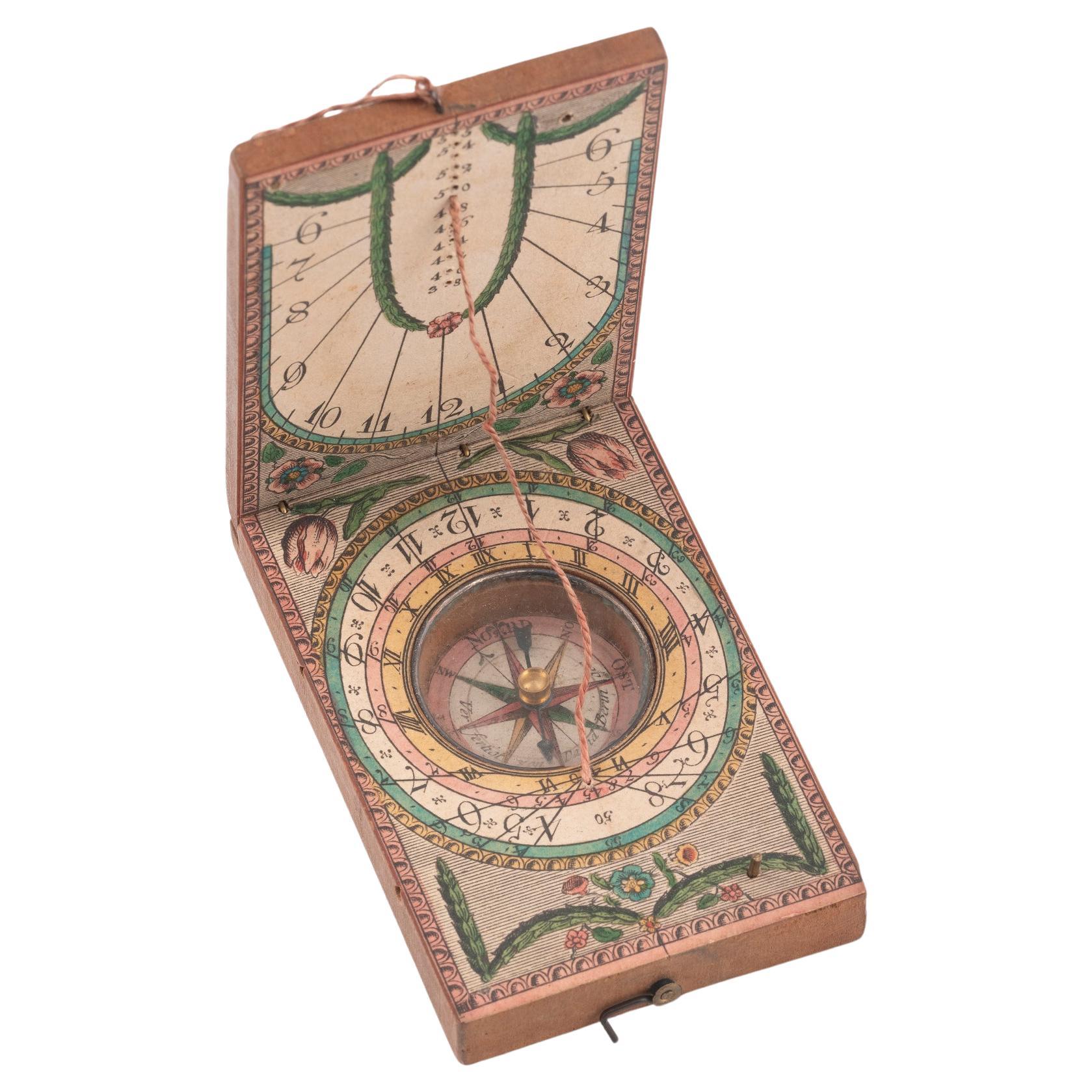SHIPPING POLICY:
No additional costs will be added to this order.
Shipping costs will be totally covered by the seller (customs duties included). 

Pocket sundial, made out of wood, with print paper element on both the internal sides and to the top.