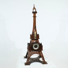 A wooden Eiffel Tower with a barometer and a thermometer, late 19th c.