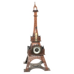 A wooden Eiffel Tower with a barometer and a thermometer, late 19th c.