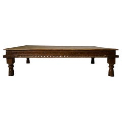 A Wooden Indian Daybed / Coffee Table With Baluster Legs