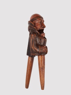 A wooden nutcracker depicting a friar, France 1870.