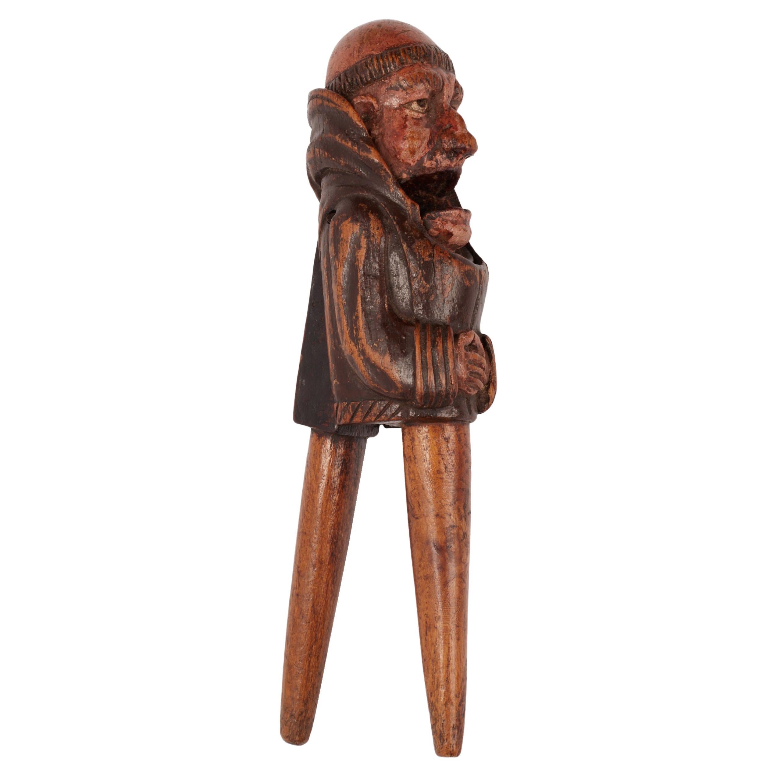 A wooden nutcracker depicting a friar, France 1870.