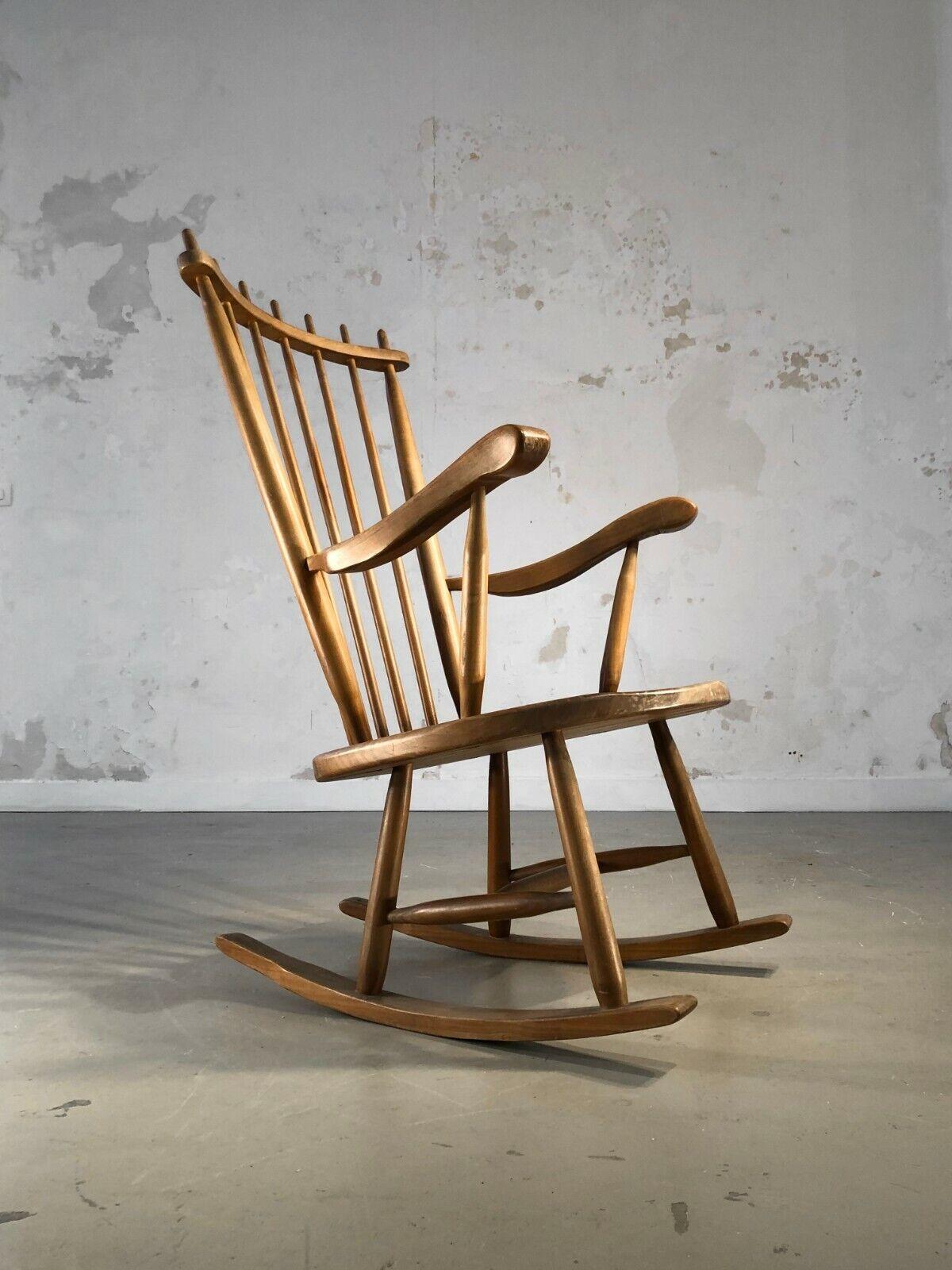 An elegant rocking chair with generous lines, Modernist, Free Form, Reconstruction, of Dansk, Scandinavian inspiration, in carved solid light wood, sometimes attributed to and certainly in the taste of Georges Nakashima, to be attributed, France or