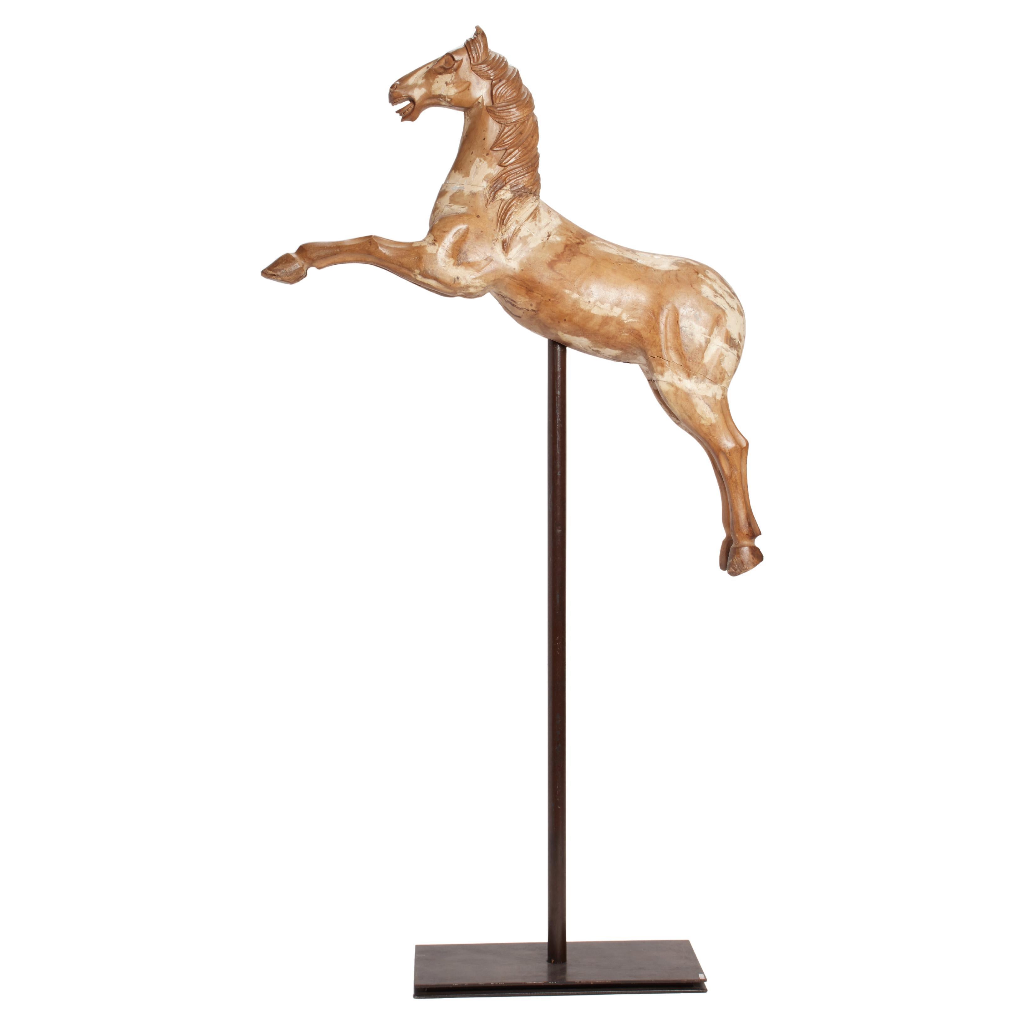 A wooden sculpture depicting a prancing carousel horse, Italy 1750. For Sale