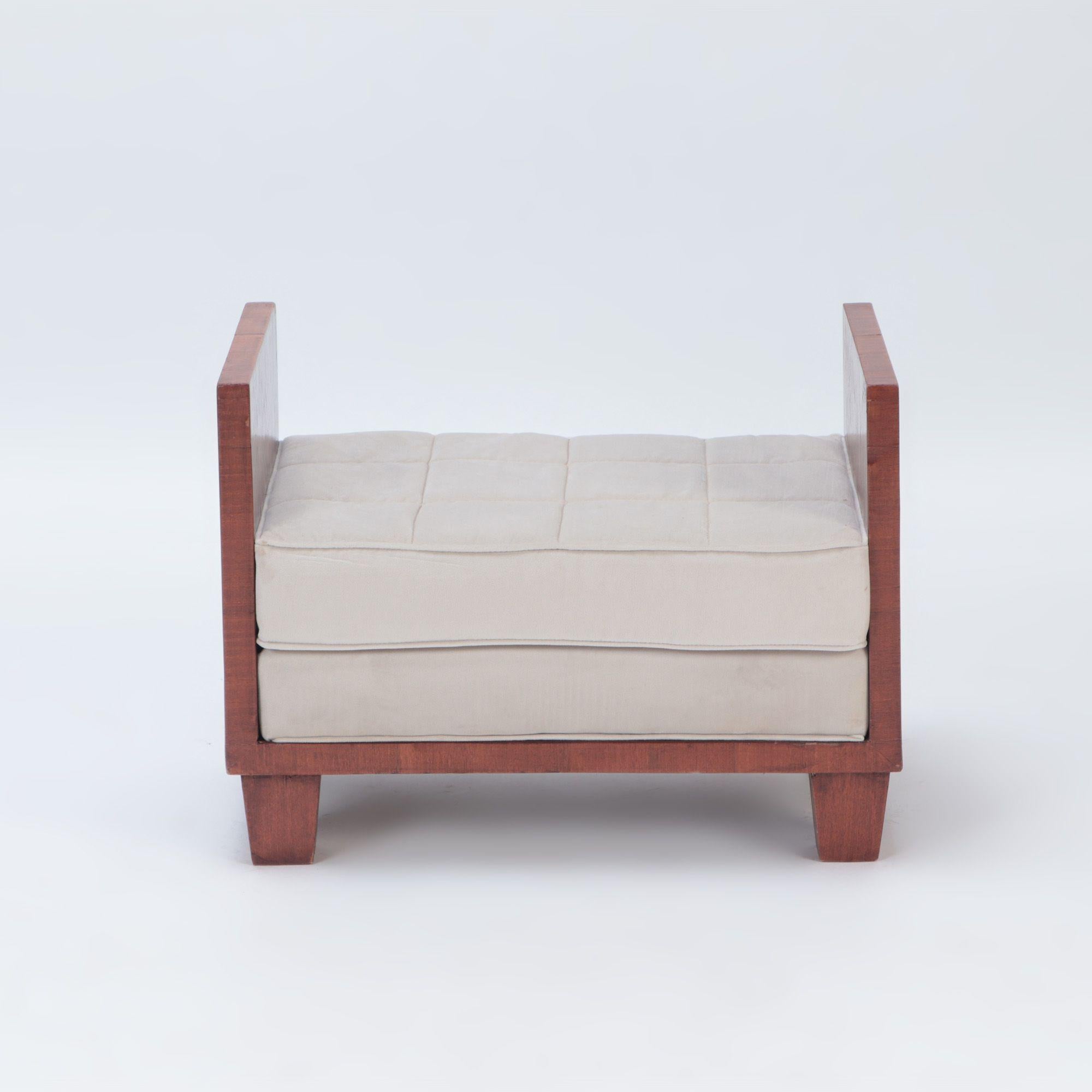 A wooden upholstered bench, in the manner of Jean-Michel Frank, contemporary.