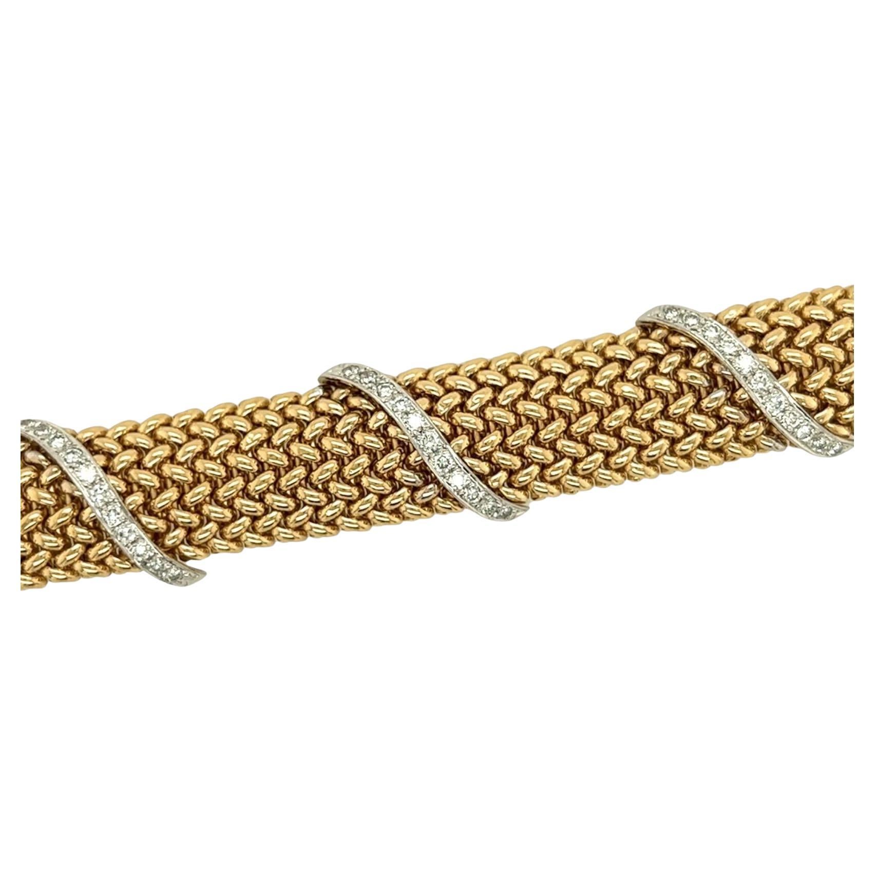 Armband aus gewebtem Gelbgold und Diamanten (Rundschliff)
