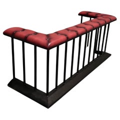 A Wrought Iron and Leather Wrap Around Fire Side Fender