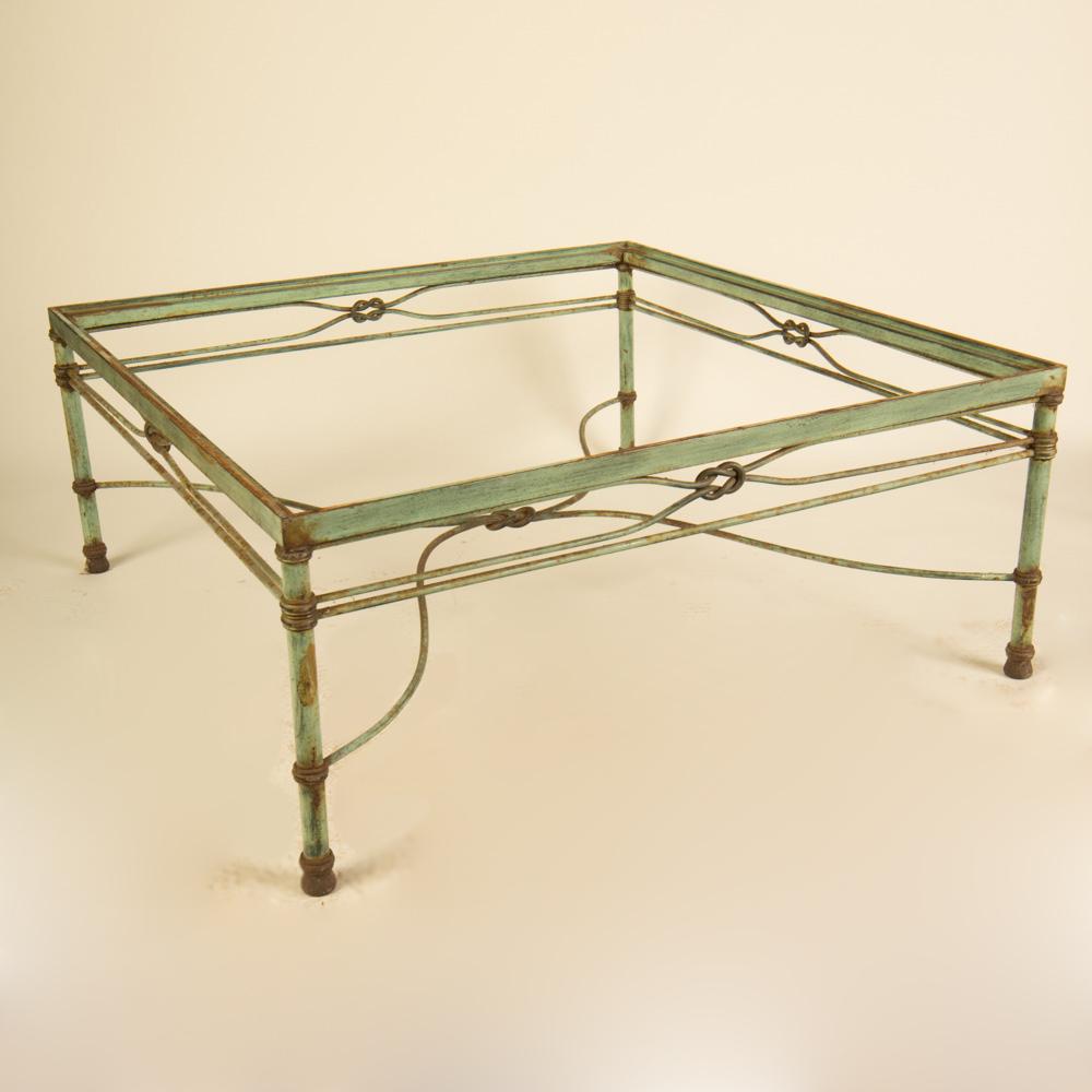 A beautiful wrought iron coffee table base with a green patina, in the manner of Giacometti, circa 1970s.