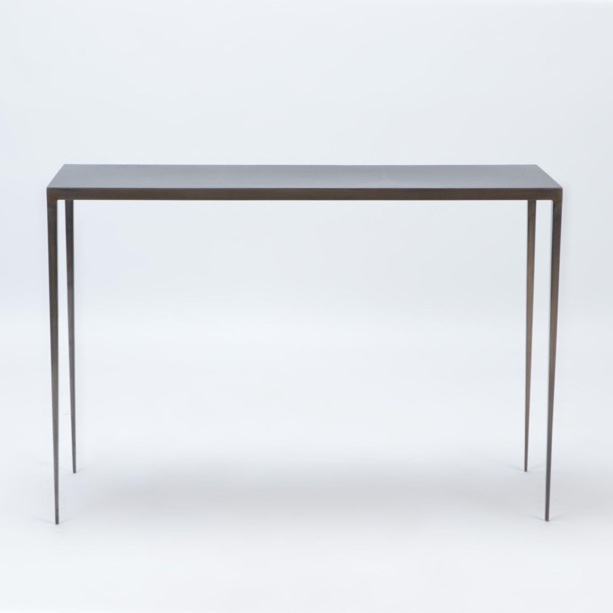 A wrought iron console with bronze wash top in the manner of Jean-Michel Frank. Contemporary.