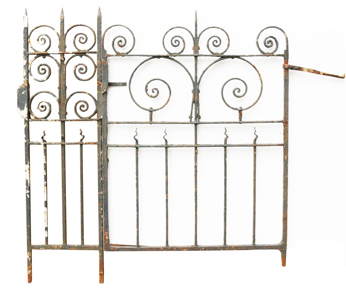 An antique wrought iron side gate, with post and a 2.75 meter length of low railing.

Additional dimensions:

Gate: Height 112cm Width 85cm Depth 3 cm

Post: Height 112 cm Width 36 cm Depth 3 cm

Railing: Height 52cm Width 275 cm Depth 3 cm.