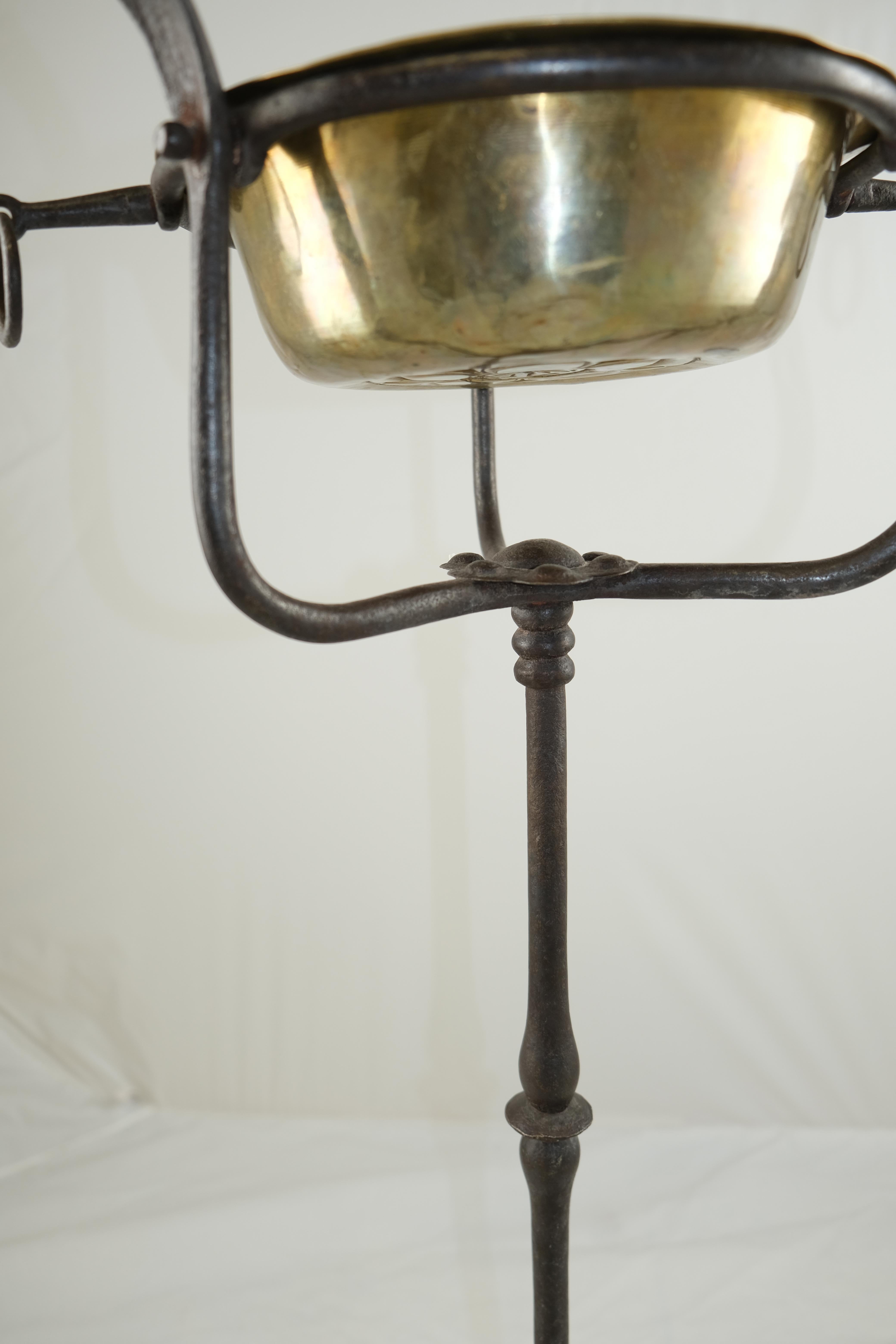 18th Century and Earlier A wrought Iron Stand with a brass bowl , 17th Century For Sale