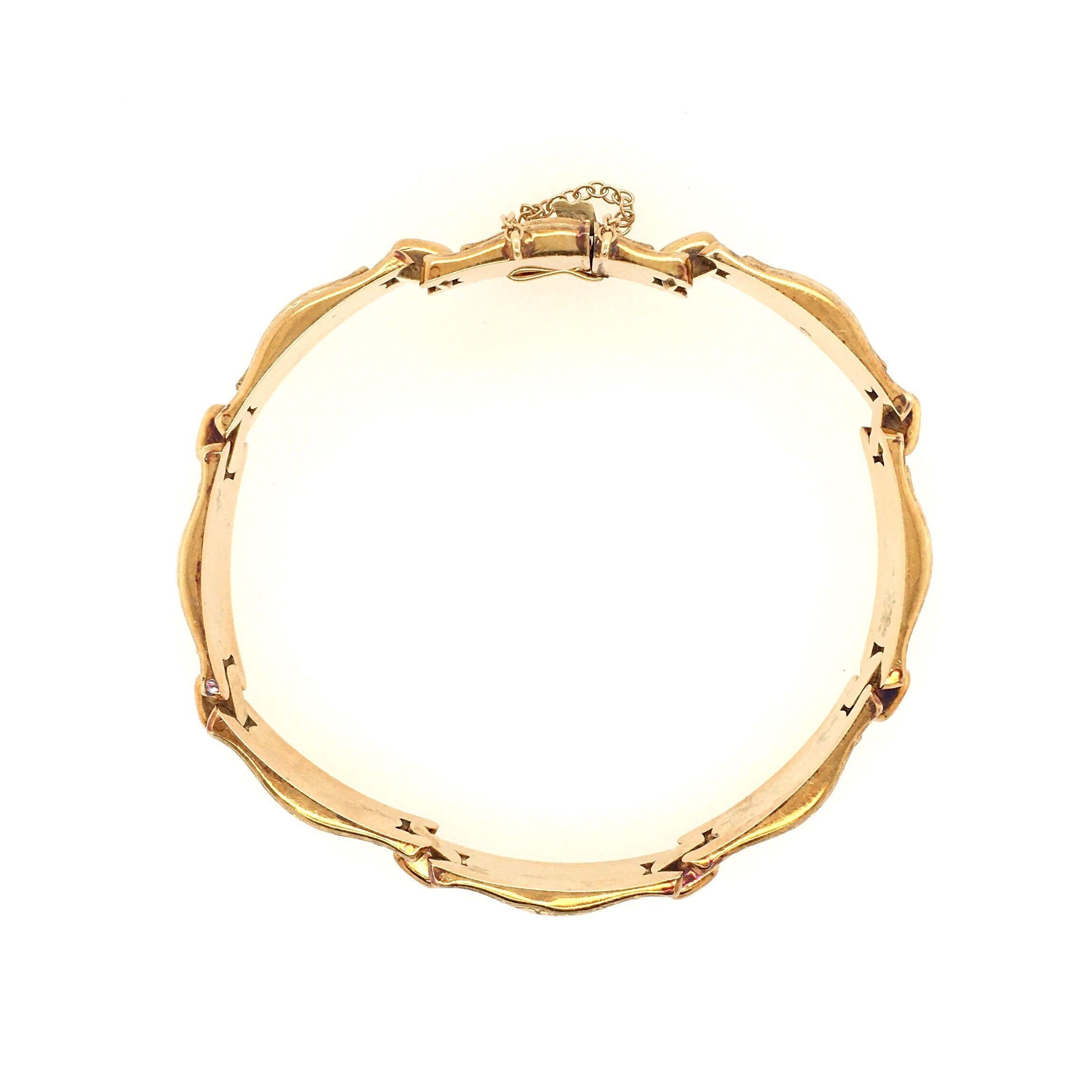 A 14 karat yellow gold bracelet . Designed as engraved links. Length is approximately 7 1/4 inches, gross weight is approximately 19.2 grams. 