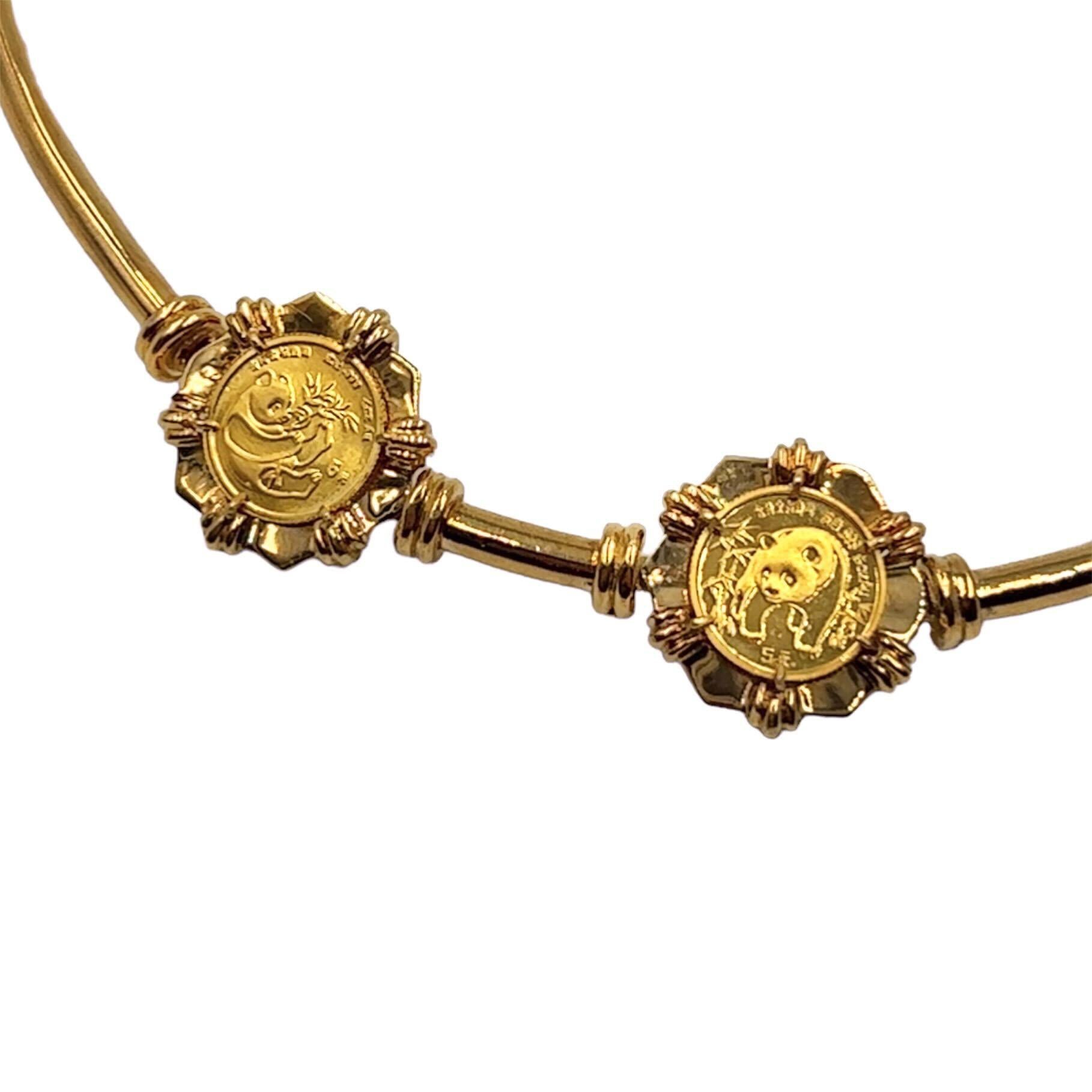 A high carat and 18 karat yellow gold necklace.  The choker is decorated at the front with four (4) five yuan gold coins from different years, each coin depicting a panda in a different pose, in a hexagonal frame with a bracket on each side holding