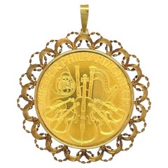 Pendentif en or jaune en forme de pièce de monnaie