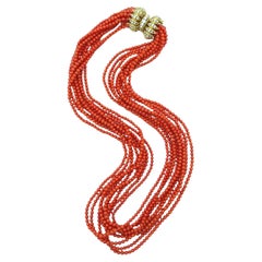 A Yellow Gold, Coral and Diamond Torsade Necklace