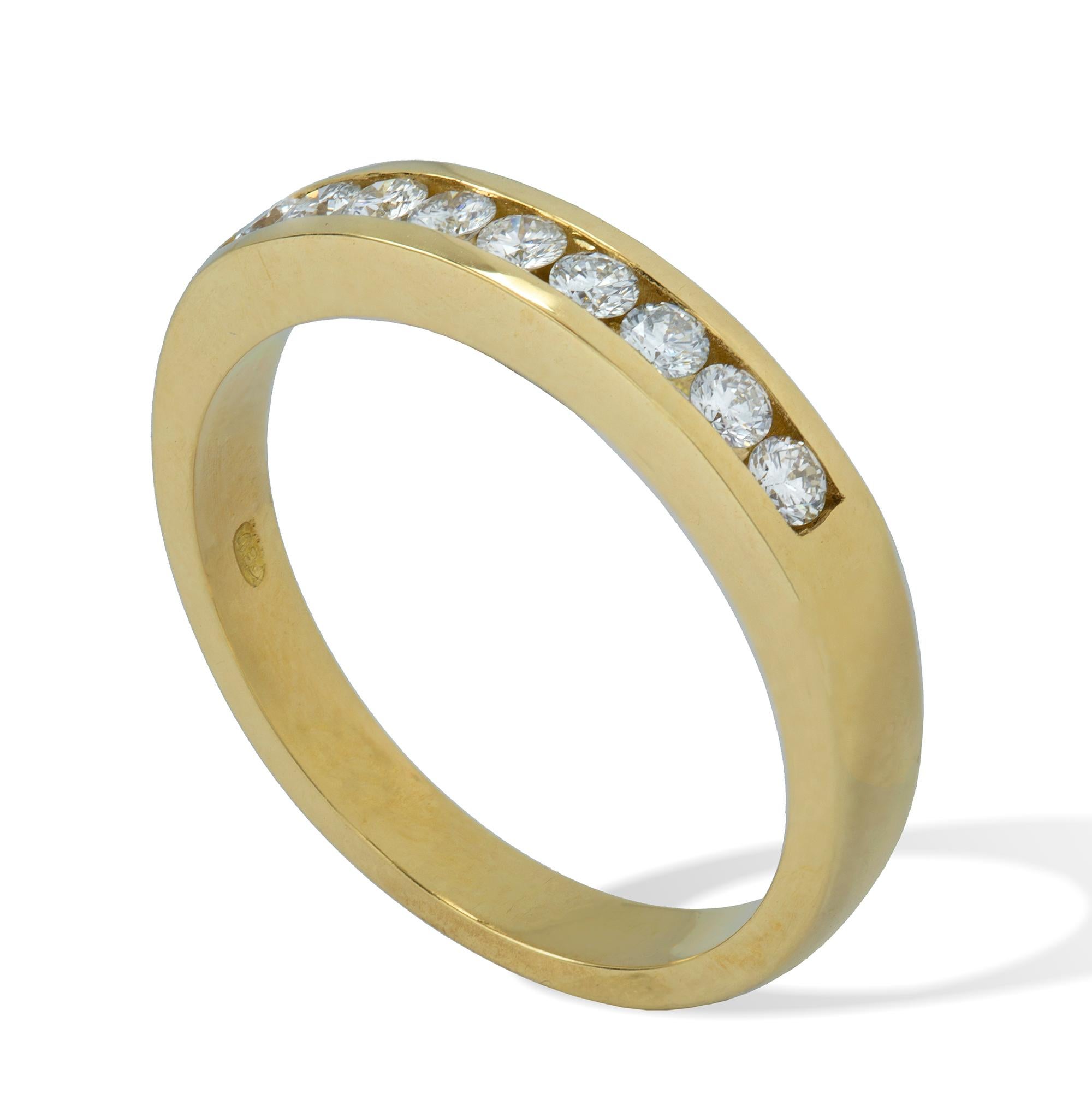 A yellow gold half eternity ring, set with nine round brilliant cut diamonds weighing 0.30 carat in total set in channel set, hallmarked 18ct gold, London 2019, measuring approximately 0.3cm wide, finger size N1/2,  gross weight 3.6 grams. 

This