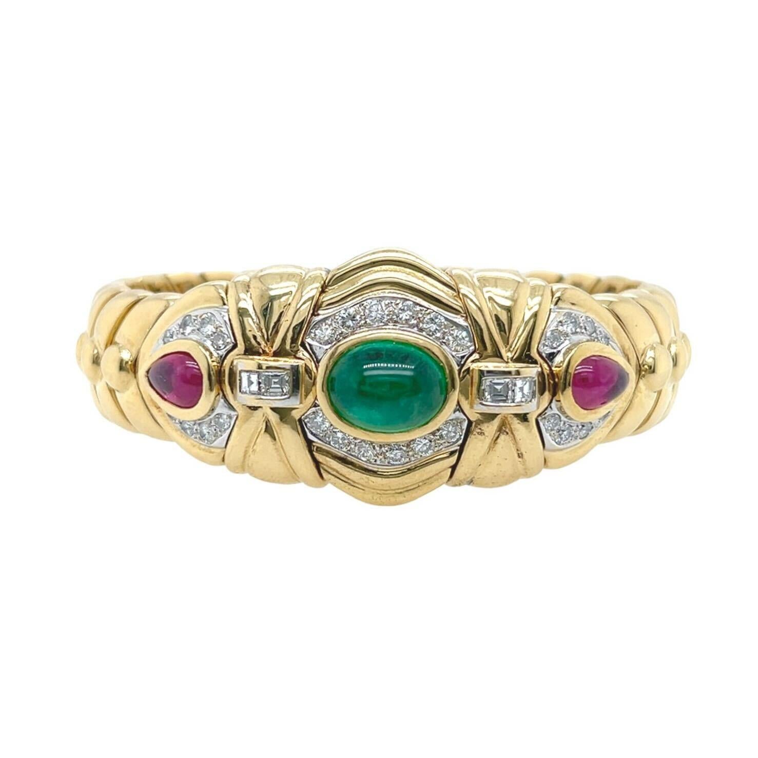A Yellow Gold, Emerald, Ruby and Diamond Cuff Bracelet In Excellent Condition For Sale In New York, NY