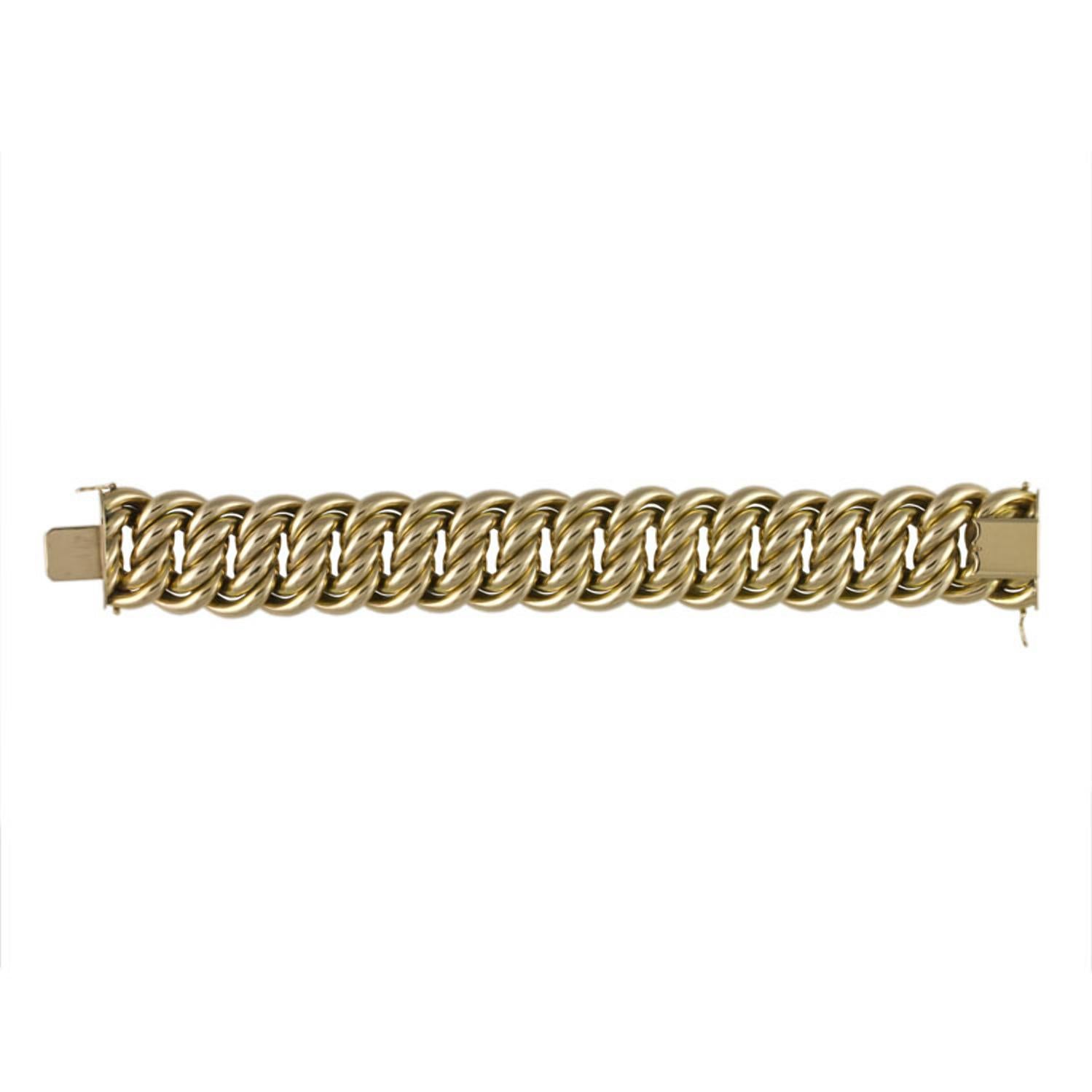 Ein gelbgoldenes Gliederarmband, die ineinandergreifenden Glieder bilden ein stilisiertes Achterdesign mit integriertem Kastenverschluss, zwei Achter-Sicherheitsverschlüsse, mit französischen Goldmarken auf der Zunge,  später gestempelt 18ct, London