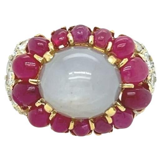 A Yellow Gold, Star Sapphire, Ruby and Diamond Ring