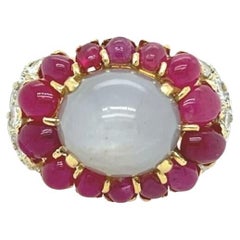 A Yellow Gold, Star Sapphire, Ruby and Diamond Ring