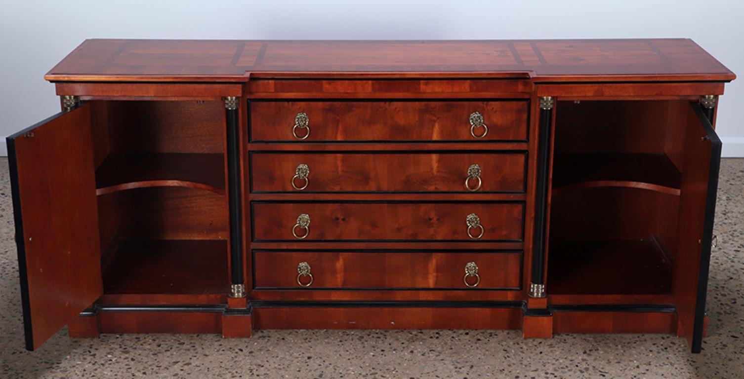 Brass A Yew wood Empire style sideboard or credenza by Century.