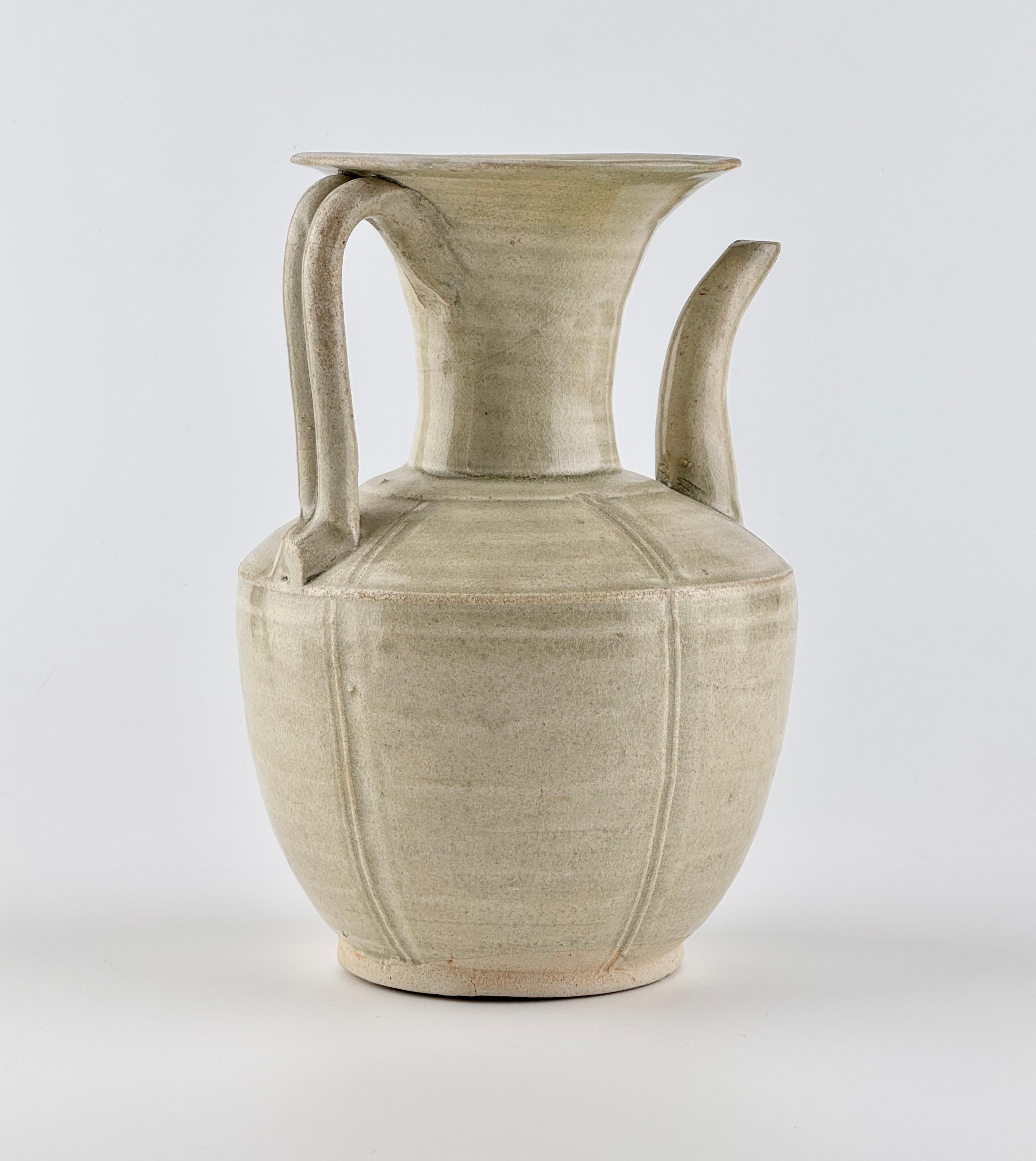 The oviform body is divided into few lobes. All covered in a finely crackled pale olive-green glaze. The surface and glaze characteristics are definitive, confirming the authenticity of this piece as a work from the Northern Song period.

Period :