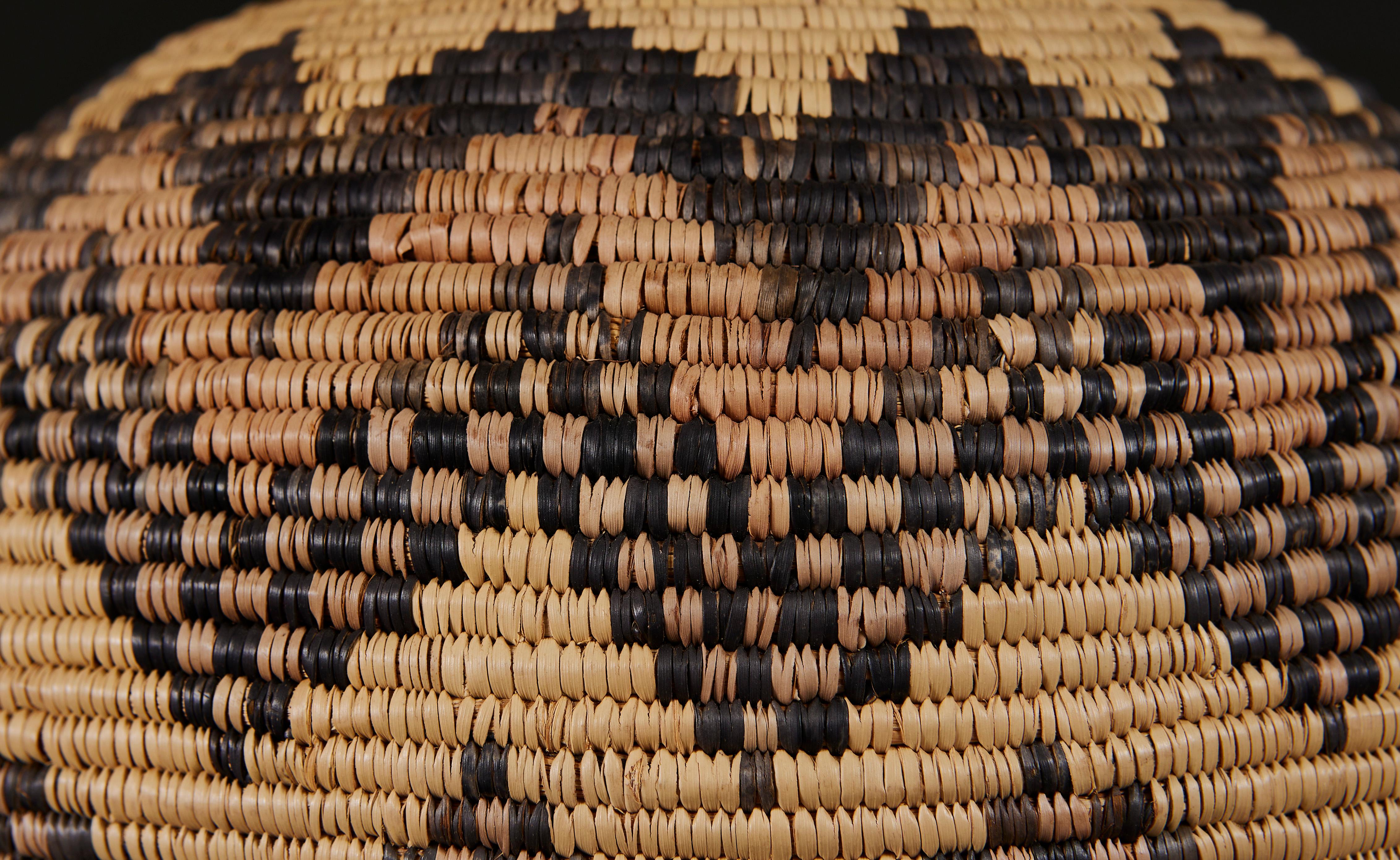 South Africa, 20th Century

A mid twentieth century Zulu basketweave lamp of spherical form, with geometric horizontal zigzag decoration throughout.

Please note:
Does not include the lampshade. Lamp has been photographed with a 16” pale cream