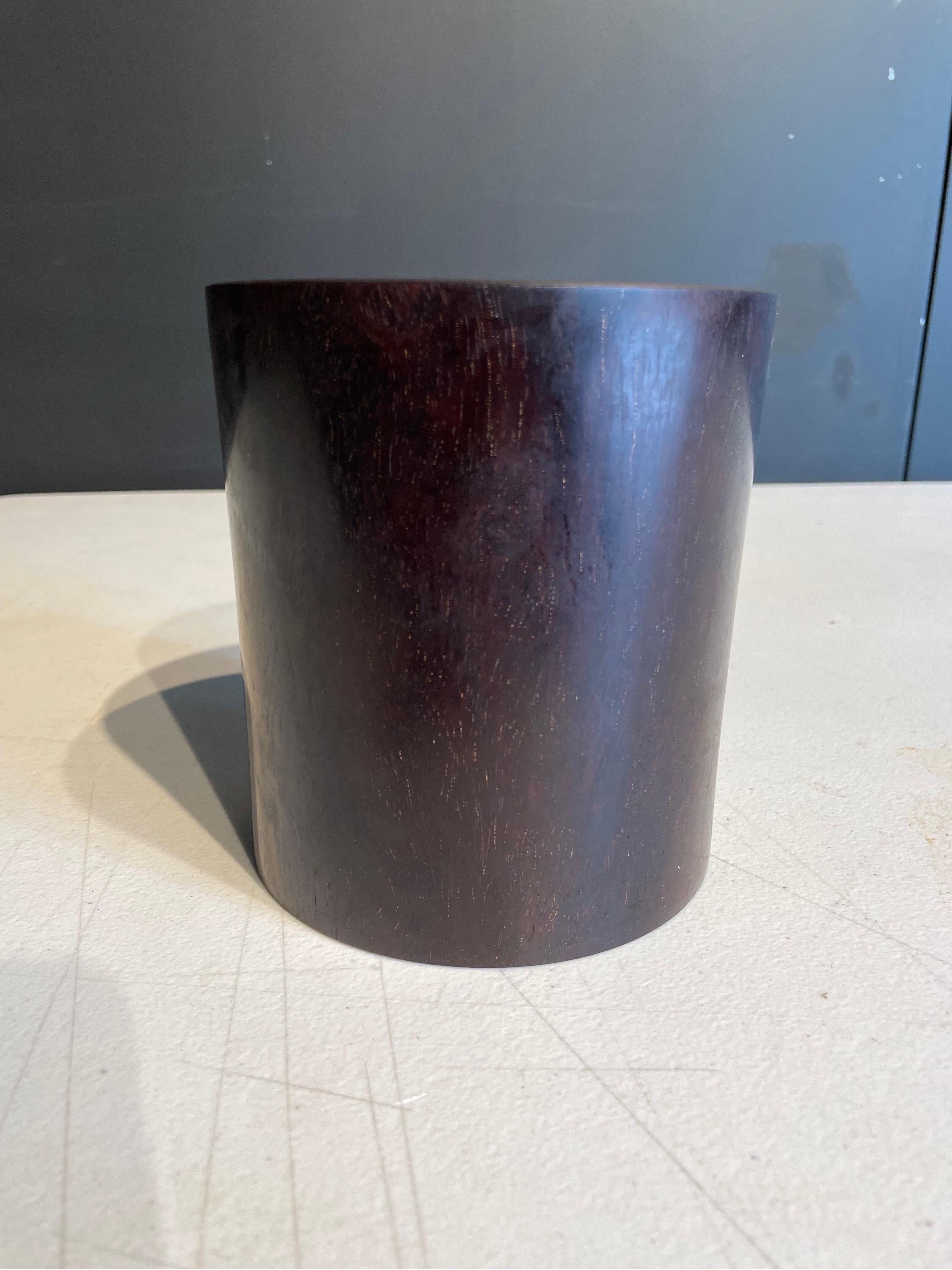 A Zitan Cylindrical Brushpot, 20th Century

Of plain form, the dark wood with even patina.

Dimension: Height: 13.5 cm Diameter: 12.5 cm

Provenance: Private New South Wales Collection.