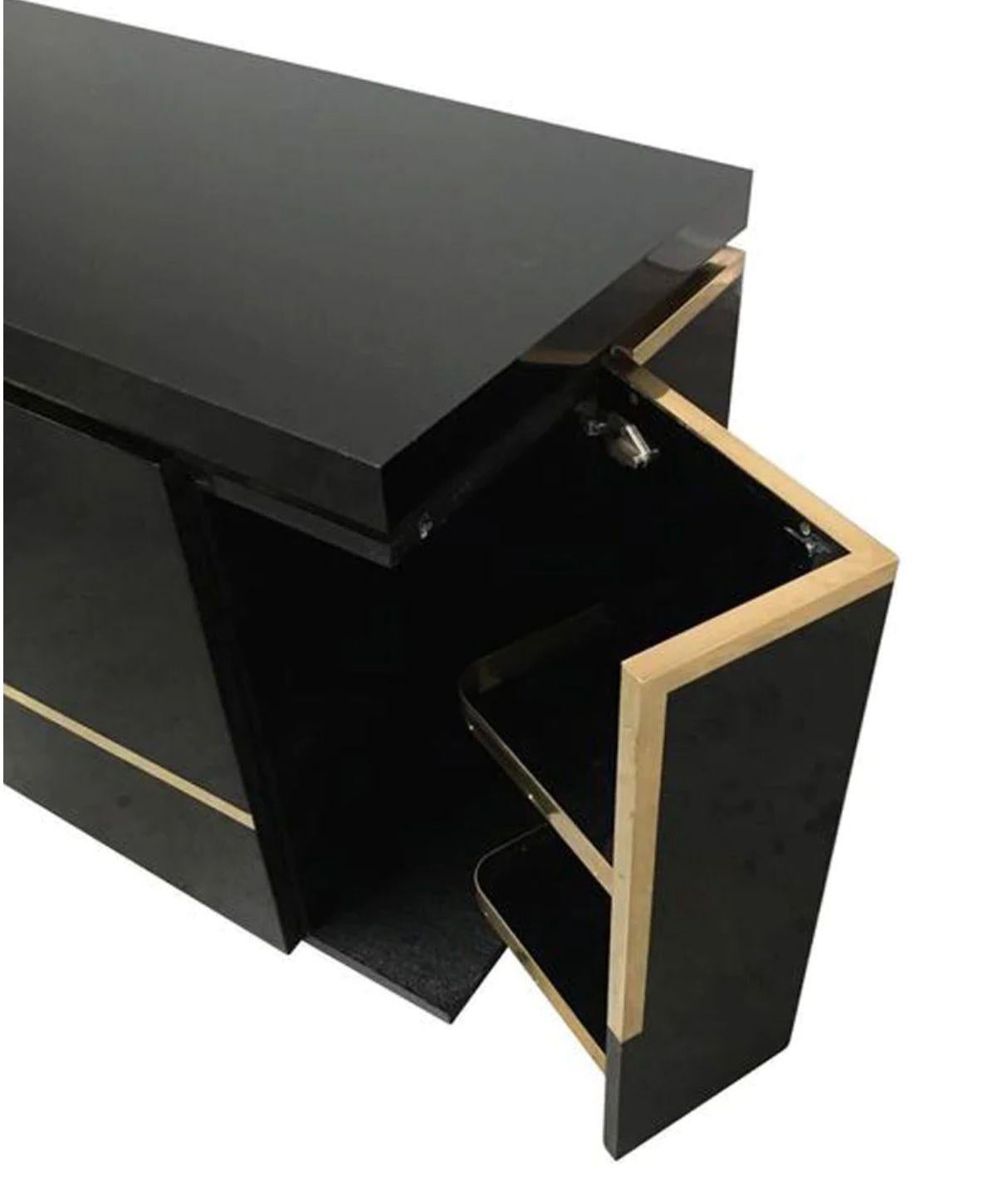 A1970s black piano lacquer and brass sideboard by Jean Claude Mahey For Sale 5